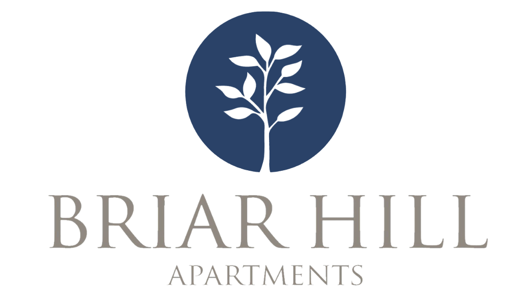 A logo for Briar Hill Apartments featuring a tree in a circle.